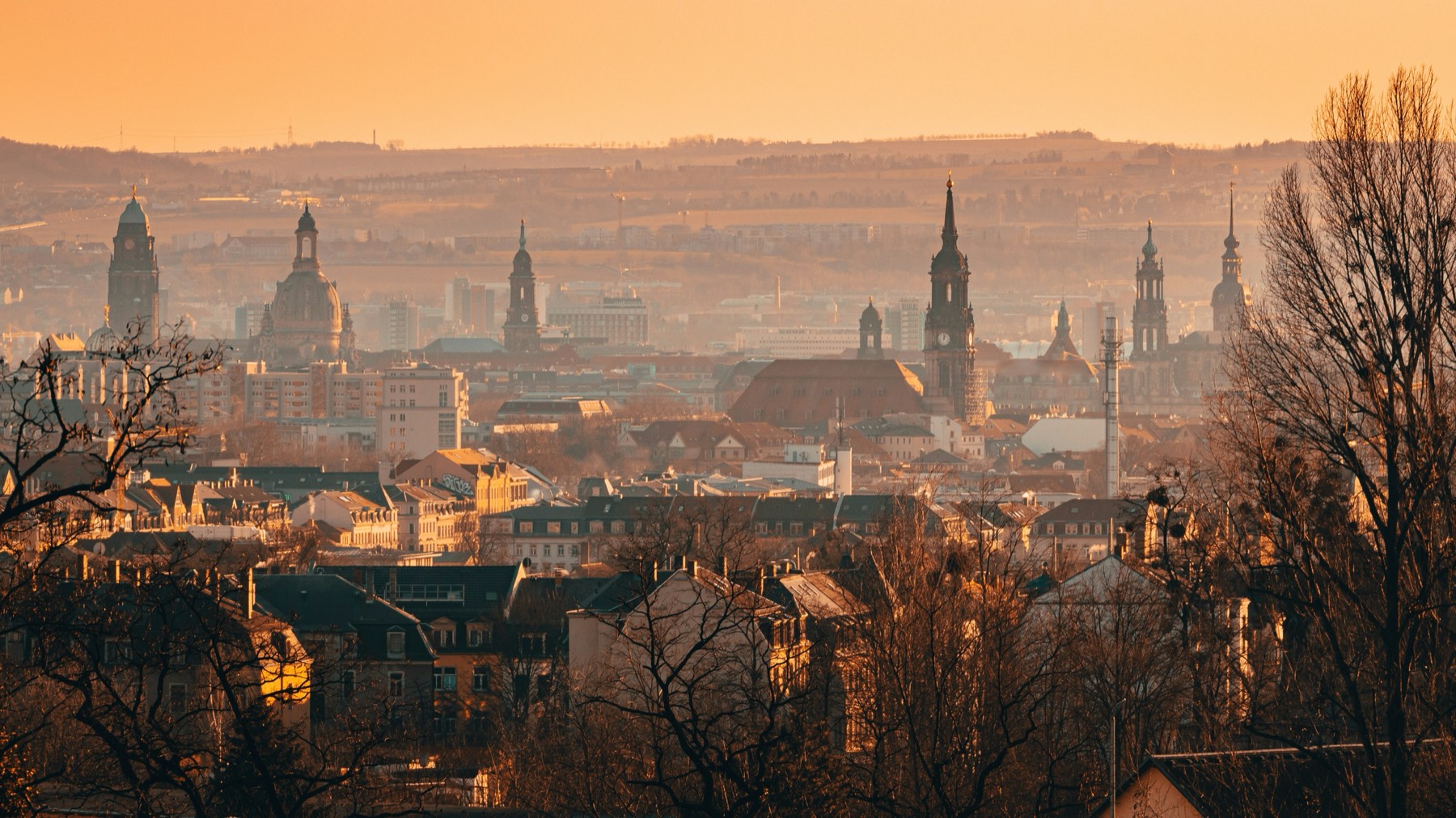 The Baroque skyline of Dresden along the Elbe, with the Frauenkirche dome and the towers of the old town